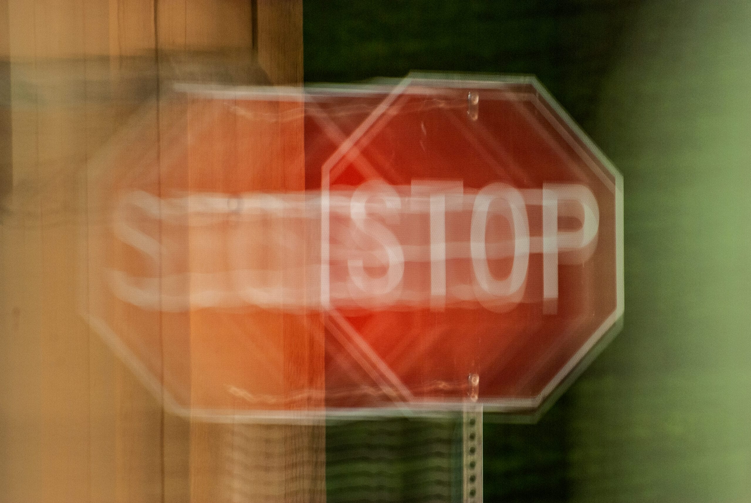 A,Blurry,Stop,Sign,Seen,Through,Impaired,Vision,Or,Distorted